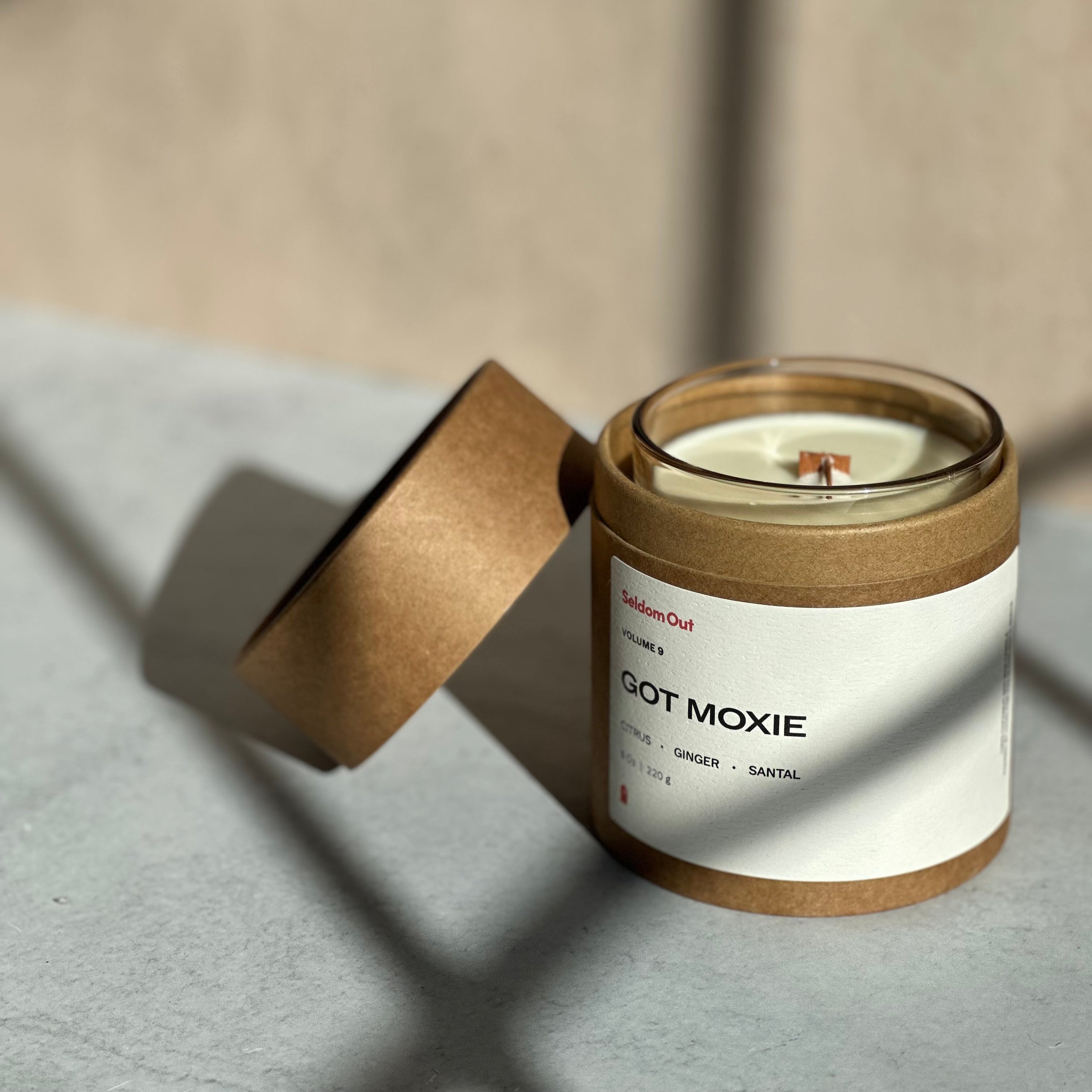 Candle with a label on a neutral background